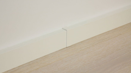 Connecting piece self-adhesive for skirting board F100201M Modern White 18 x 50 mm - 2pcs.